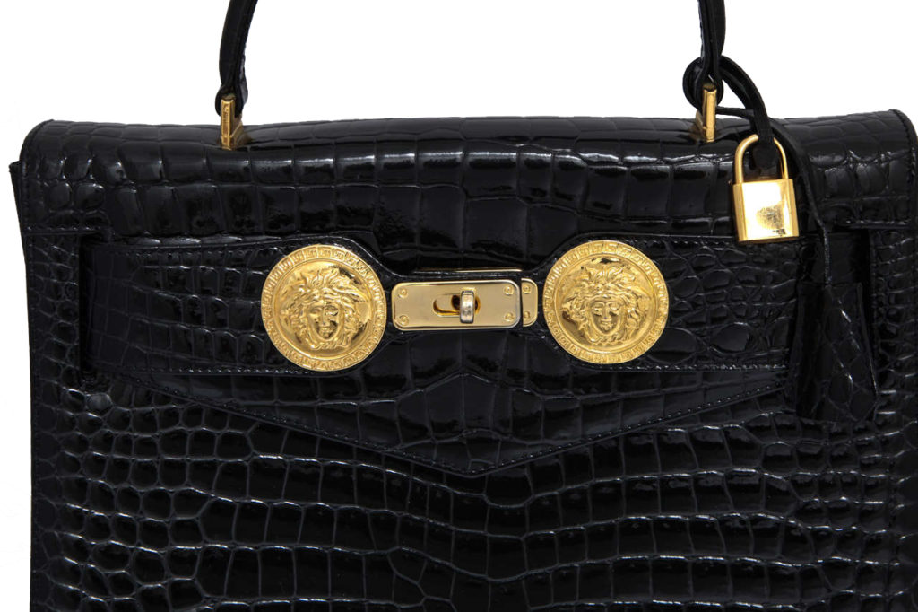 Vintage Gianni Versace genuine black leather Kelly style bag with Meda –  eNdApPi ***where you can find your favorite designer  vintages..authentic, affordable, and lovable.