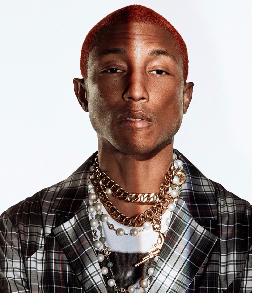 Pharrell wearing Depuis 1924 Vintage Chanel gun motif necklace